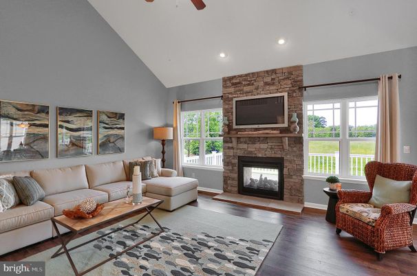 Fireplace, Interior, Living room, Recessed Lighting, Stone Walls, Wood Texture Flooring