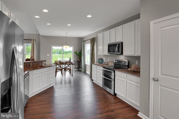 Dining room, Interior, Kitchen, Pendant Lights, Recessed Lighting, Stainless Steel Appliances, Wood Texture Flooring