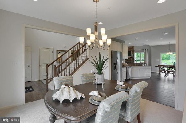 Chandelier, Dining room, Interior, Kitchen, Pendant Lights, Recessed Lighting, Stainless Steel Appliances, Wood Texture Flooring