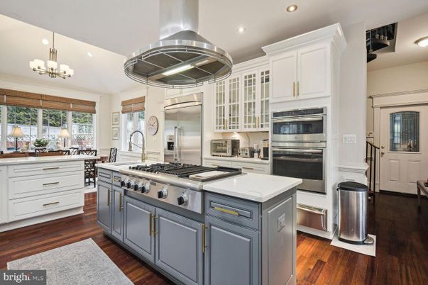 Chandelier, Interior, Kitchen, Pendant Lights, Recessed Lighting, Stainless Steel Appliances, Wood Texture Flooring