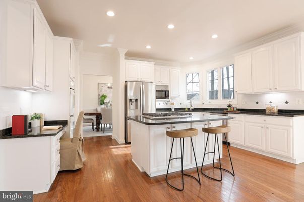 Dining room, Interior, Kitchen, Recessed Lighting, Stainless Steel Appliances, Wood Texture Flooring