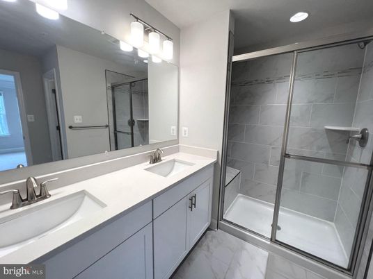 Bathroom, Dual Sink Vanities, Glass Shower, Interior, Marble, Recessed Lighting