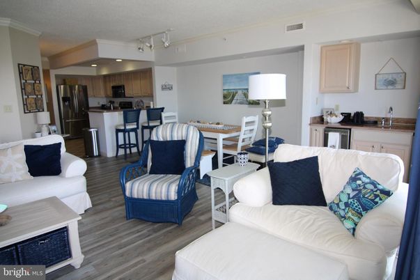 Dining room, Interior, Kitchen, Living room, Recessed Lighting, Stainless Steel Appliances, Wood Texture Flooring