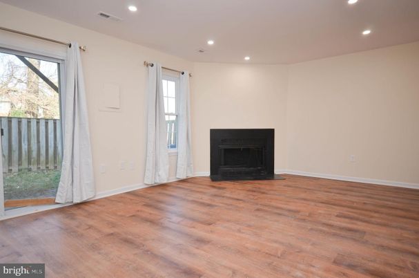 Empty room, Fireplace, Interior, Recessed Lighting, Wood Texture Flooring