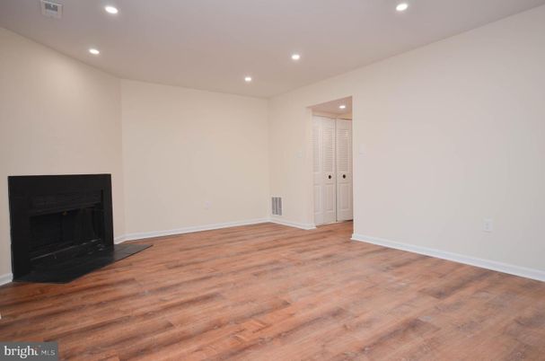 Empty room, Fireplace, Interior, Recessed Lighting, Wood Texture Flooring