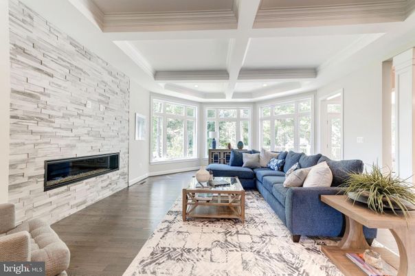 Fireplace, Interior, Living room, Recessed Lighting, Stone Walls, Wood Texture Flooring