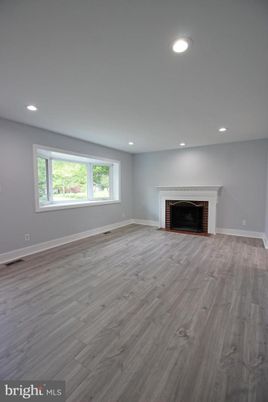 Empty room, Fireplace, Interior, Recessed Lighting, Wood Texture Flooring