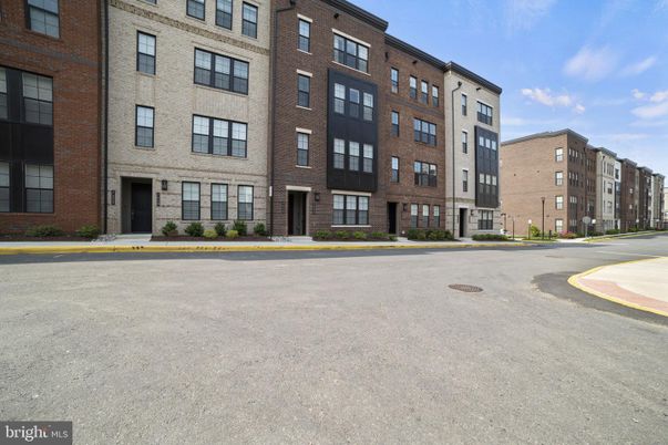 Exterior, Facade, Brick Facade, Condo Building