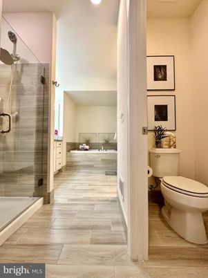 Bathroom, Bedroom, Glass Shower, Interior, Recessed Lighting, Wood Texture Flooring