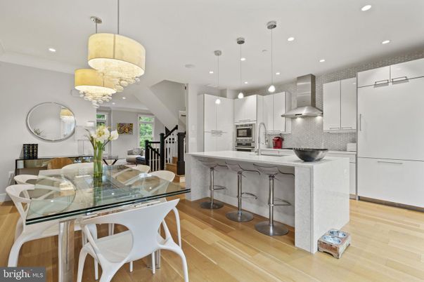 Chandelier, Dining room, Interior, Kitchen, Pendant Lights, Recessed Lighting, Stainless Steel Appliances, Wood Texture Flooring