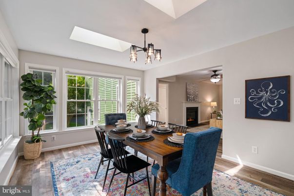 Dining room, Fireplace, Interior, Pendant Lights, Wood Texture Flooring