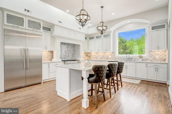 Chandelier, Interior, Kitchen, Pendant Lights, Recessed Lighting, Stainless Steel Appliances, Wood Texture Flooring