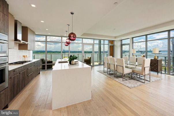 Dining room, Interior, Kitchen, Pendant Lights, Recessed Lighting, Stainless Steel Appliances, Water, Wood Texture Flooring