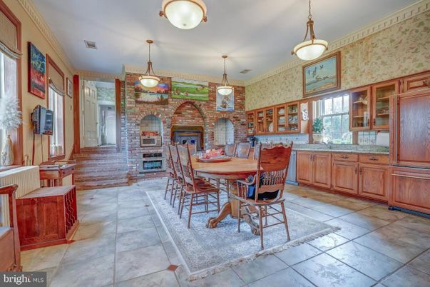 Dining room, Fireplace, Interior, Pendant Lights, Stone Walls