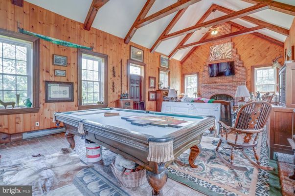 Billiard Table, Fireplace, Game Room, Interior, Stone Walls, Wooden Beams, Wooden Walls