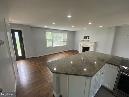 Fireplace, Interior, Kitchen, Recessed Lighting, Wood Texture Flooring