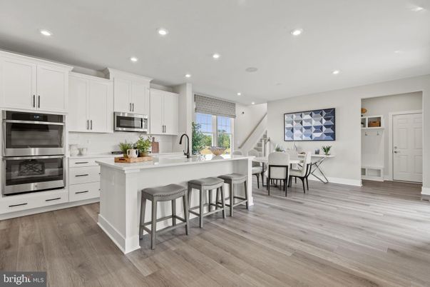 Dining room, Interior, Kitchen, Recessed Lighting, Stainless Steel Appliances, Wood Texture Flooring