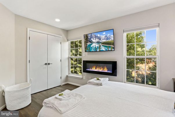 Bedroom, Fireplace, Interior, Recessed Lighting, Wood Texture Flooring