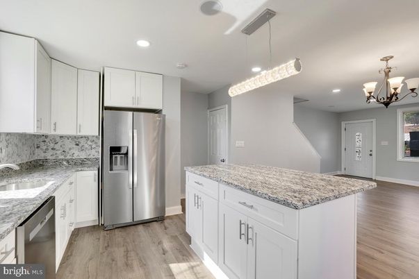 Chandelier, Interior, Kitchen, Pendant Lights, Recessed Lighting, Stainless Steel Appliances, Wood Texture Flooring