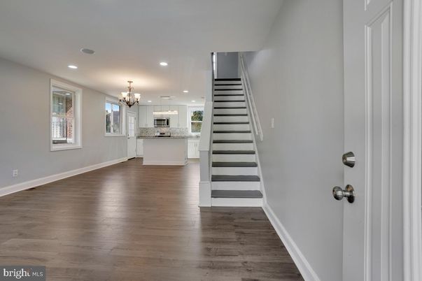 Chandelier, Interior, Kitchen, Recessed Lighting, Stainless Steel Appliances, Wood Texture Flooring