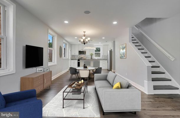 Chandelier, Dining room, Interior, Kitchen, Living room, Pendant Lights, Recessed Lighting, Stainless Steel Appliances, Wood Texture Flooring