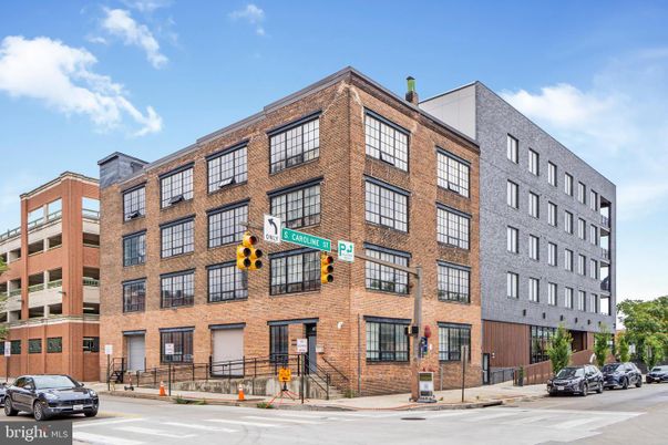 Exterior, Facade, Brick Facade, Condo Building
