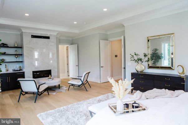 Fireplace, Interior, Living room, Marble Walls, Recessed Lighting, Wood Texture Flooring