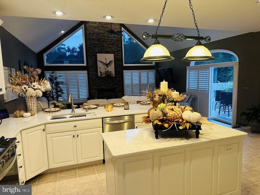 Fireplace, Interior, Kitchen, Pendant Lights, Recessed Lighting, Stainless Steel Appliances, Stone Walls