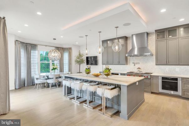 Chandelier, Dining room, Interior, Kitchen, Pendant Lights, Recessed Lighting, Stainless Steel Appliances, Wood Texture Flooring
