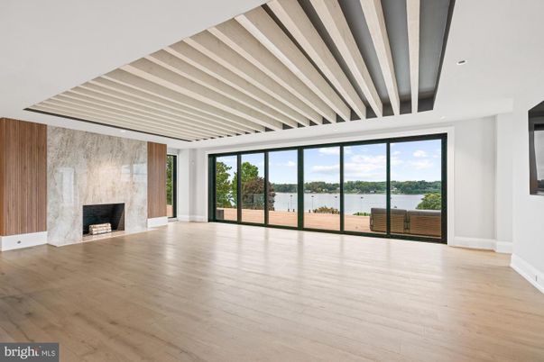 Empty room, Fireplace, Interior, Recessed Lighting, Water, Wood Texture Flooring