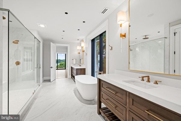Bathroom, Dual Sink Vanities, Free Standing Baths, Glass Shower, Interior, Marble, Marble Walls, Recessed Lighting