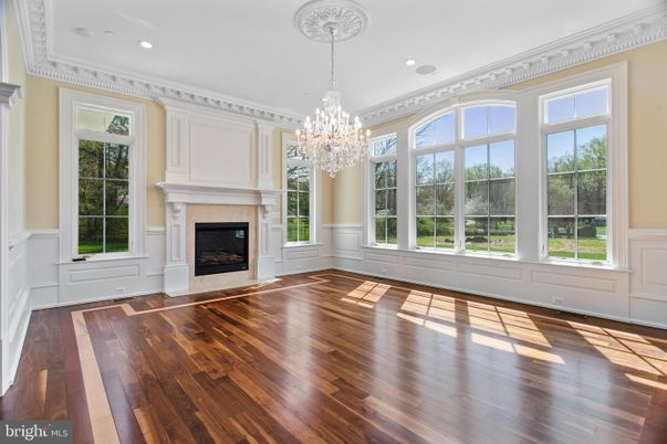 Chandelier, Empty room, Fireplace, Interior, Recessed Lighting, Wood Texture Flooring