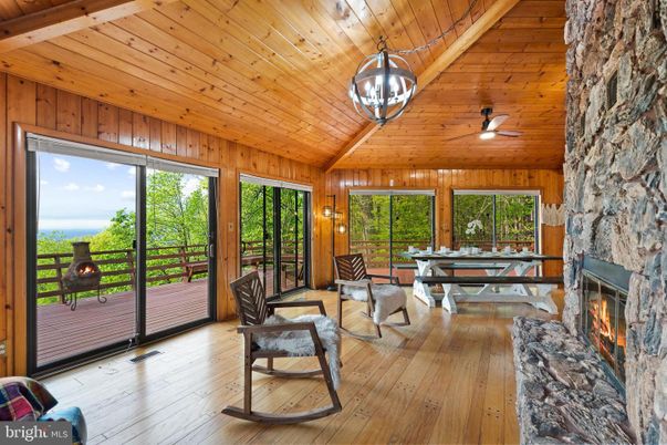 Dining room, Fireplace, Interior, Sun Room, Wooden Ceilings, Wood Texture Flooring, Wooden Walls