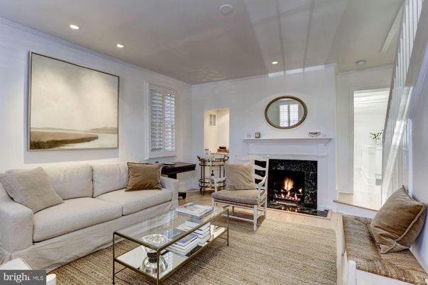 Dining room, Fireplace, Interior, Living room, Recessed Lighting, Wood Texture Flooring