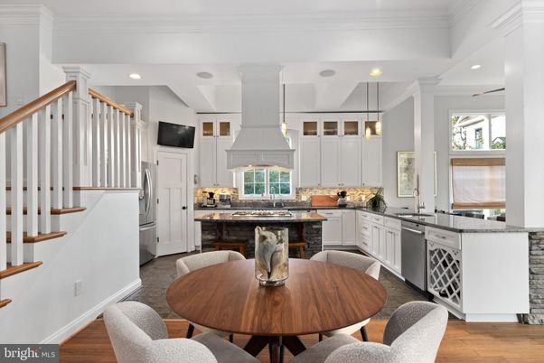 Dining room, Interior, Kitchen, Pendant Lights, Recessed Lighting, Stainless Steel Appliances, Wood Texture Flooring