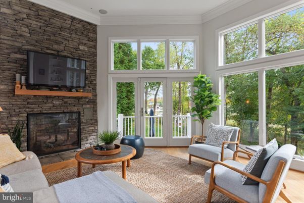 Fireplace, Interior, Stone Walls, Sun Room, Wood Texture Flooring