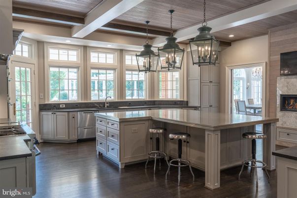Fireplace, Interior, Kitchen, Pendant Lights, Recessed Lighting, Stainless Steel Appliances, Wooden Ceilings, Wood Texture Flooring