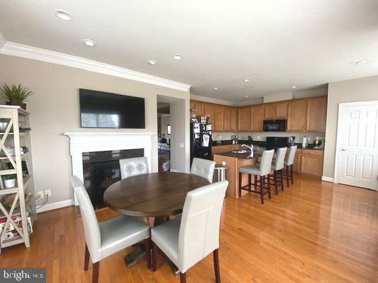 Dining room, Fireplace, Interior, Kitchen, Recessed Lighting, Wood Texture Flooring