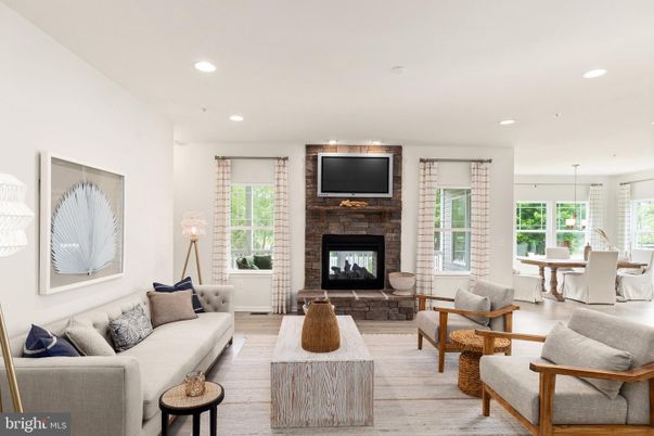 Dining room, Fireplace, Interior, Living room, Pendant Lights, Recessed Lighting, Wood Texture Flooring