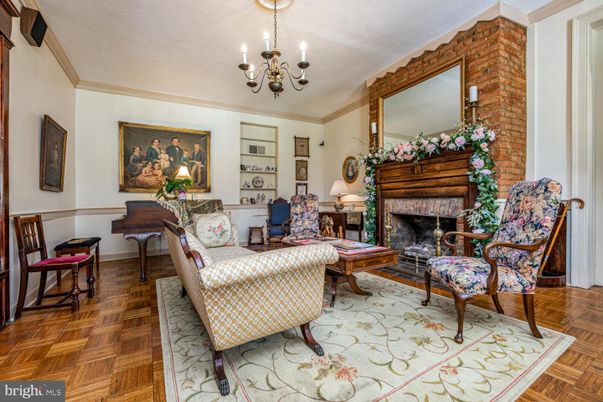 Chandelier, Fireplace, Interior, Living room, Piano, Stone Walls, Wood Texture Flooring