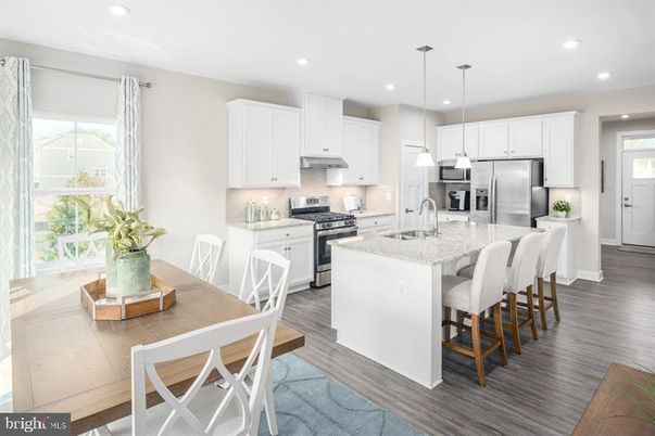 Dining room, Interior, Kitchen, Pendant Lights, Recessed Lighting, Stainless Steel Appliances, Wood Texture Flooring