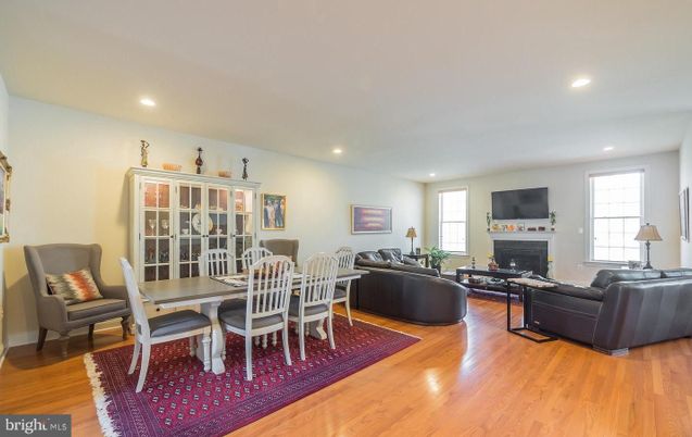 Dining room, Fireplace, Interior, Living room, Recessed Lighting, Wood Texture Flooring