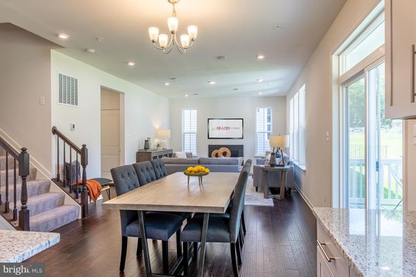 Chandelier, Dining room, Fireplace, Interior, Living room, Recessed Lighting, Wood Texture Flooring