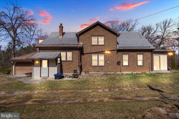Attached, Exterior, Facade, Brick Facade, Solar Panels, Brick Traditional