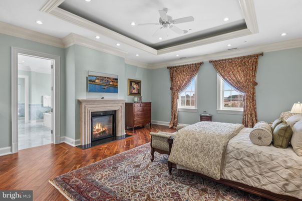 Bedroom, Fireplace, Interior, Recessed Lighting, Wood Texture Flooring