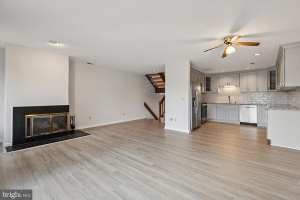 Fireplace, Interior, Kitchen, Recessed Lighting, Wood Texture Flooring
