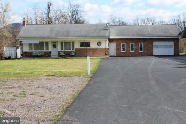 Attached, Exterior, Facade, Brick Facade, Cape Cod