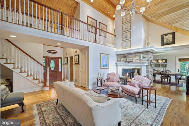 Chandelier, Dining room, Fireplace, Interior, Living room, Recessed Lighting, Wooden Beams, Wooden Ceilings, Wood Texture Flooring