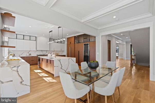 Dining room, Interior, Kitchen, Pendant Lights, Recessed Lighting, Stainless Steel Appliances, Wood Texture Flooring