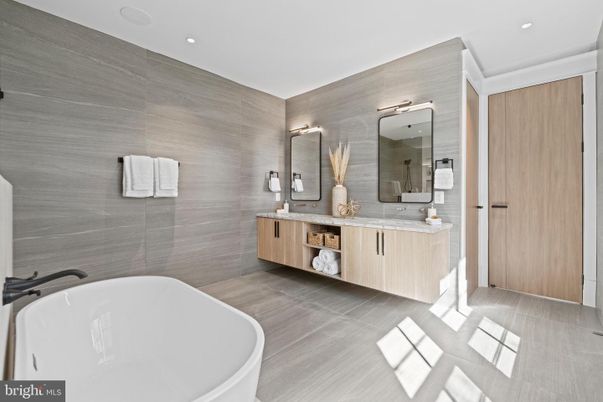 Bathroom, Dual Sink Vanities, Free Standing Baths, Interior, Recessed Lighting, Wood Texture Flooring